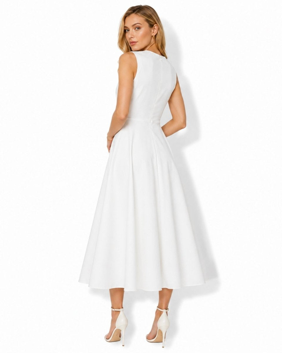 A woman modeling a sleeveless white midi dress with a structured back and flared skirt, shown from the back against a clean white studio background.