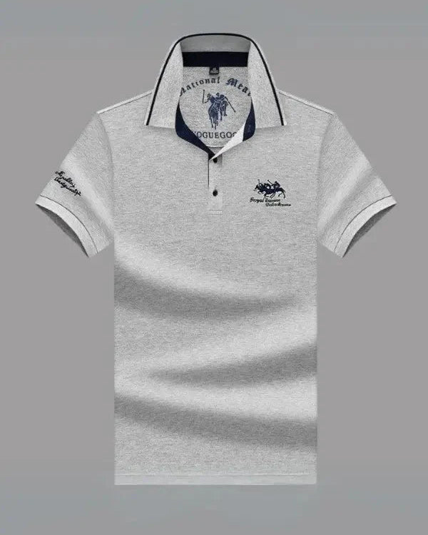 Gray polo shirt with brand logo on a gray background