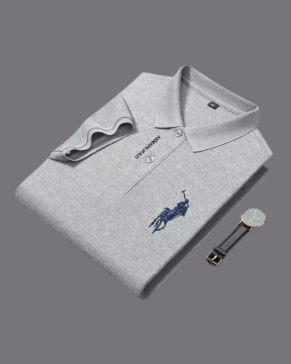 Gray polo shirt with a logo on a gray background