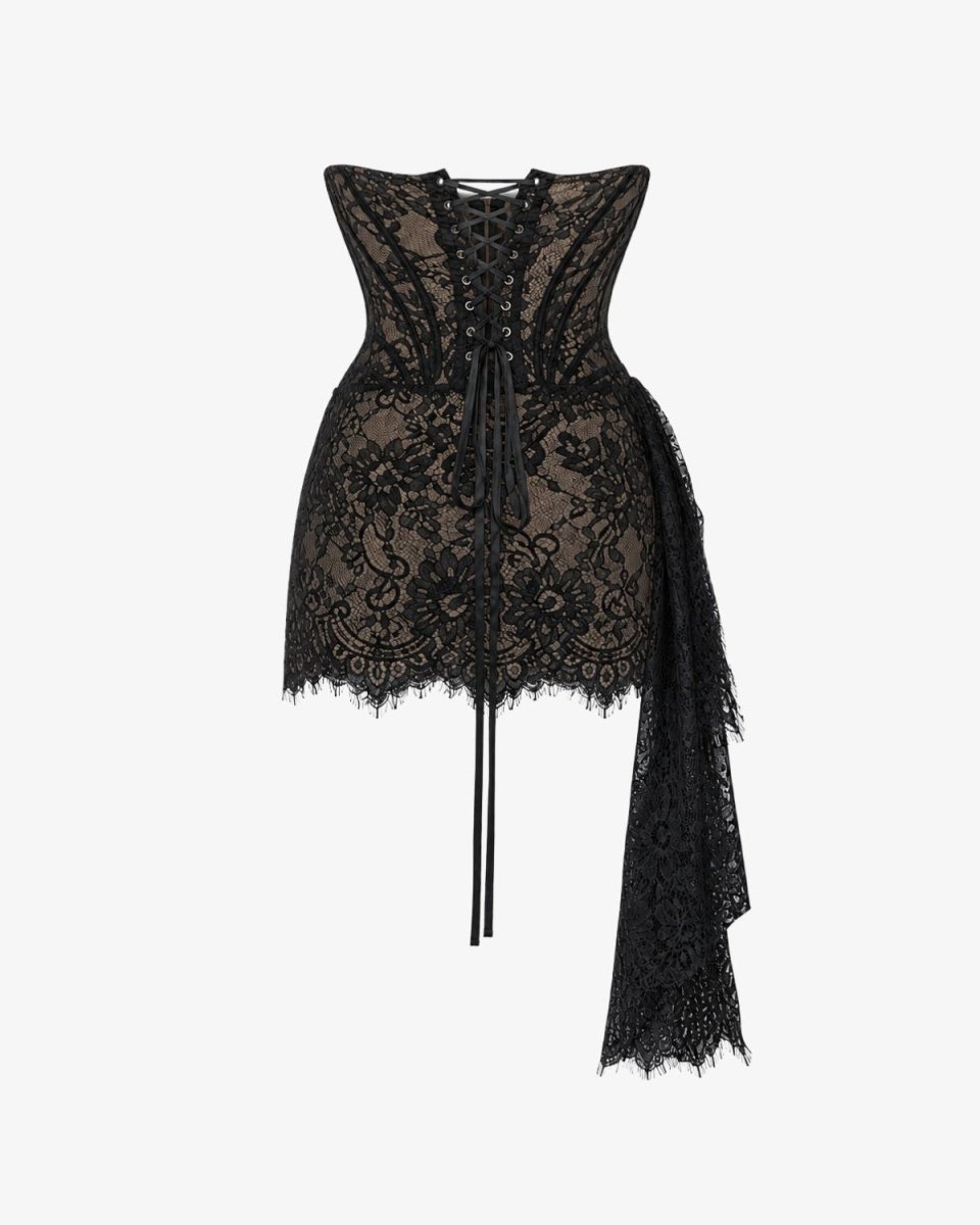 Black lace corset-style top with floral lace overlay, front lace-up detailing, and a long asymmetrical draped lace panel on a light gray background.