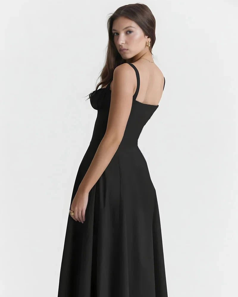 Black dress with a cutout back on a white background