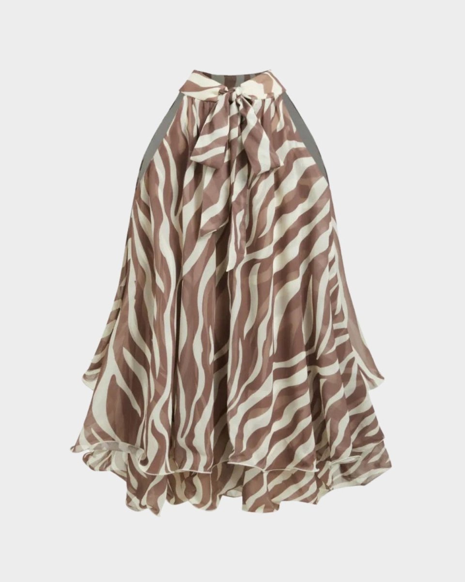 A high-low tiered skirt with a brown and beige zebra stripe pattern, featuring a ruffled high waistband and a large bow at the center front, shown against a light gray background.