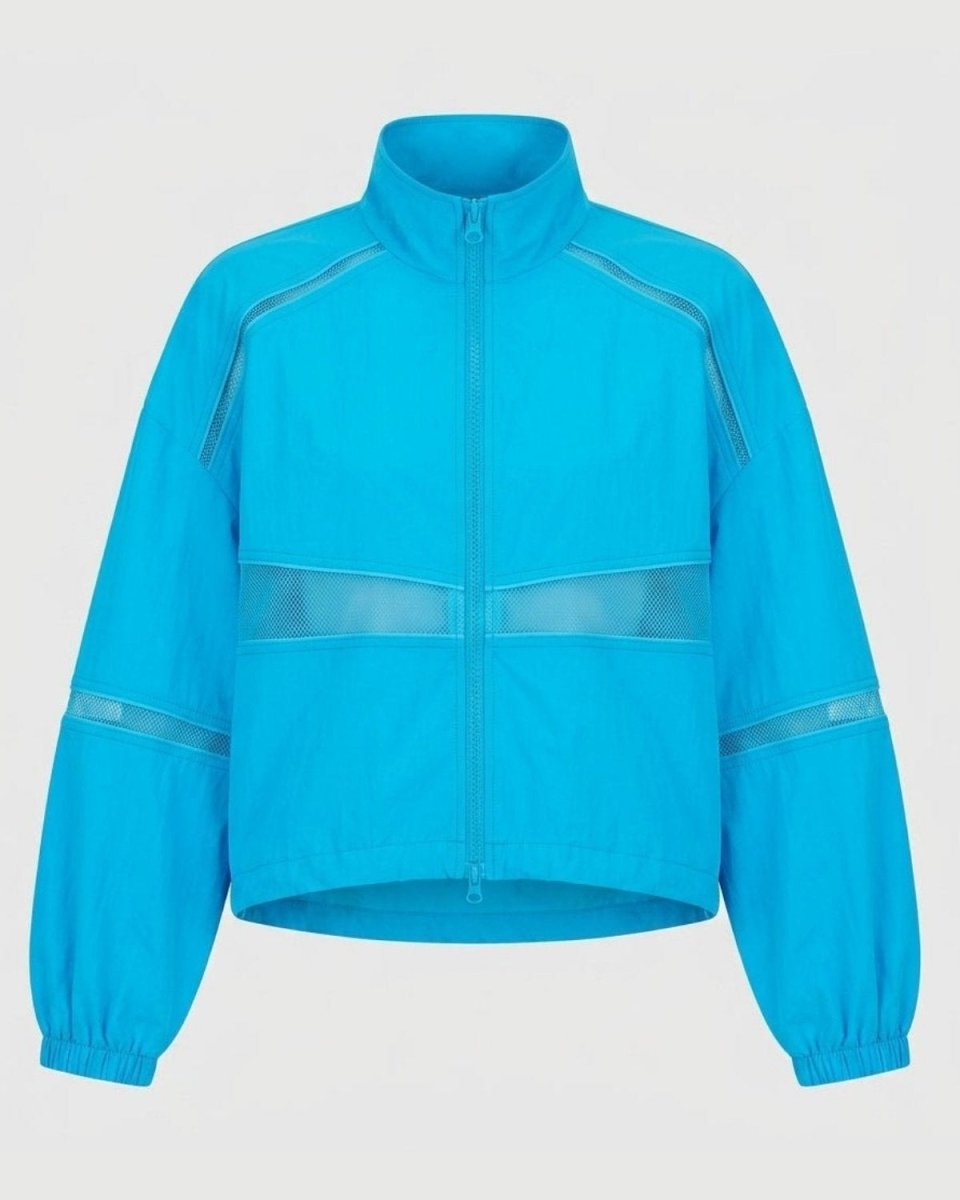 A bright turquoise blue lightweight zip-up jacket with reflective silver-gray trim details, displayed on a neutral light gray background.