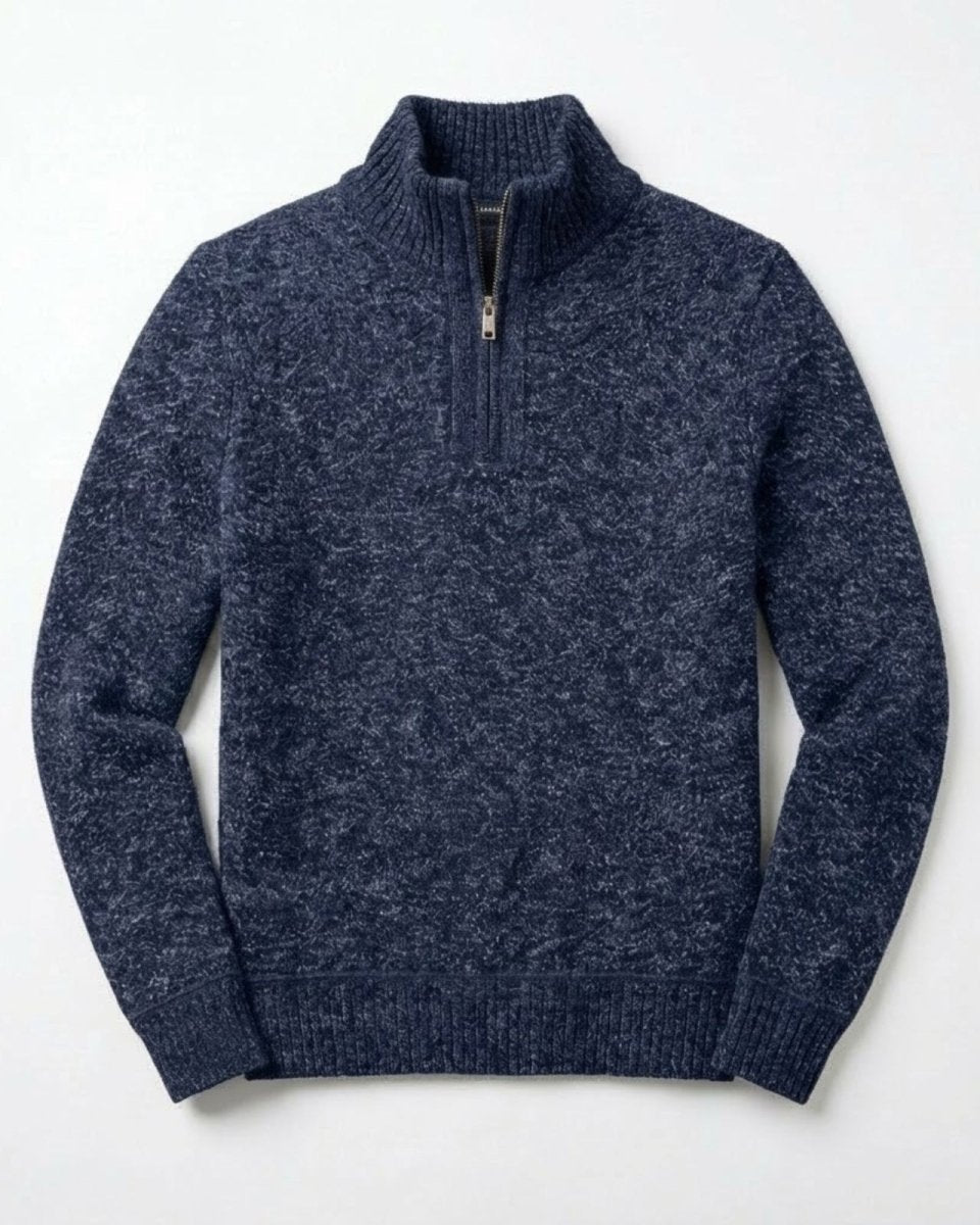 Flatlay product shot of the front of the Elyson quarter-zip sweater, detailing the gunmetal zipper and ribbed mock neck.