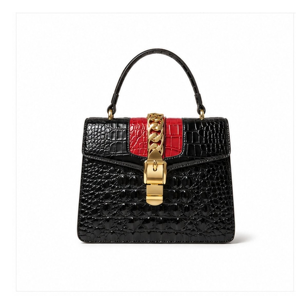 black crocodile embossed top handle satchel bag featuring a red contrast stripe and chunky gold chain detail on a clean white background.