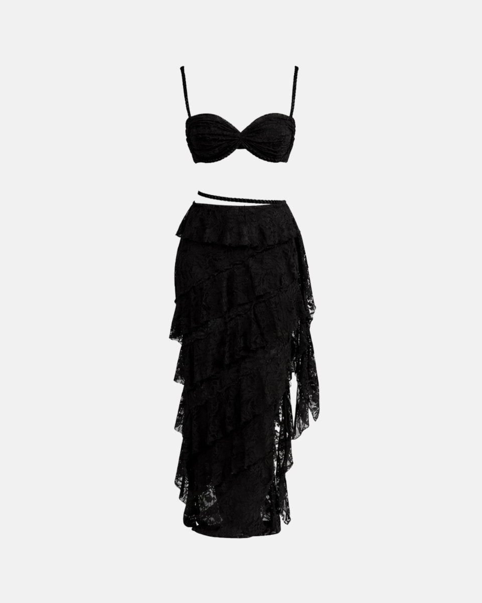 Flat lay front view of black lace tiered ruffle maxi skirt and ruched bralette matching two piece outfit
