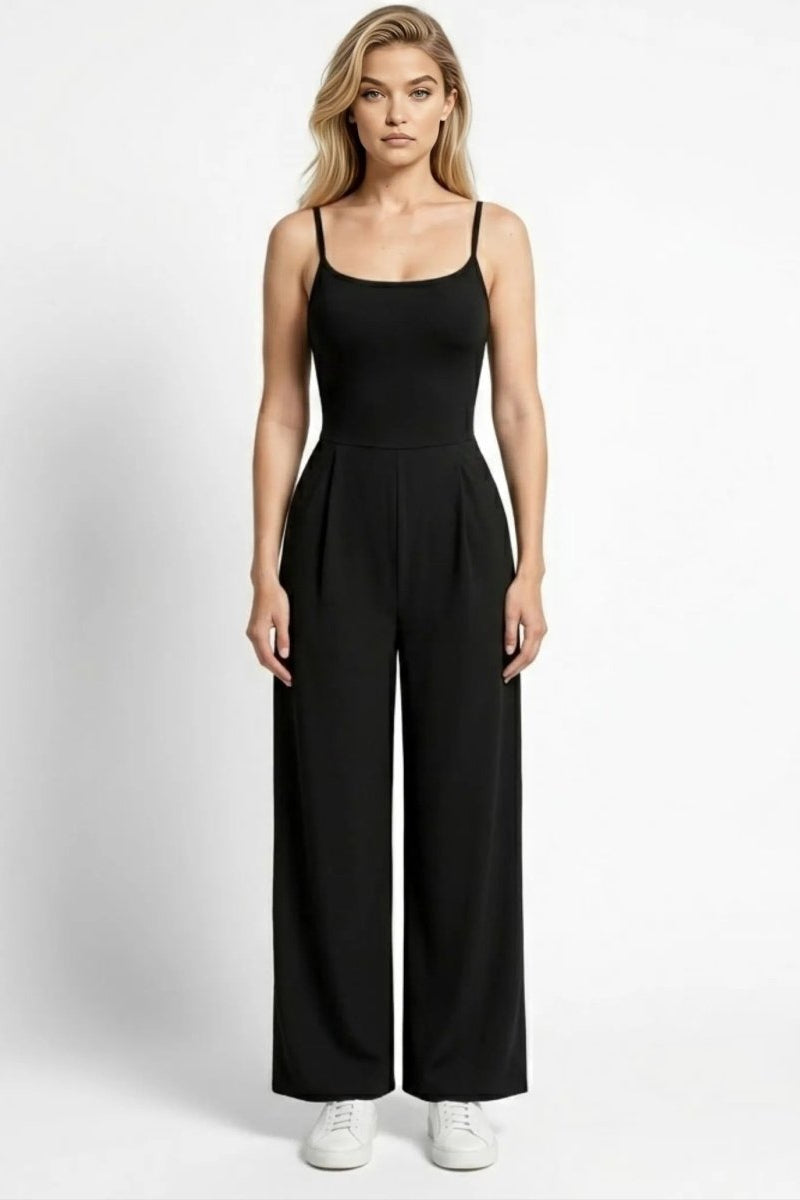Woman modeling Fenlo Form black wide leg jumpsuit with scoop neck and spaghetti straps