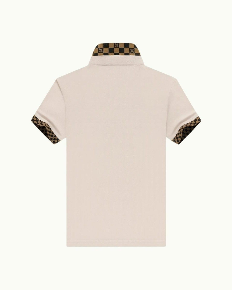 Back view of the pink polo shirt on a white background, displaying the clean design and checkered collar detail.