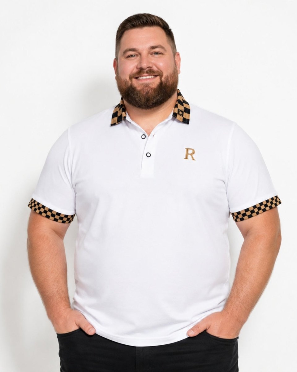 A smiling man wearing a white short-sleeve polo shirt with a black and gold checkered pattern on the collar and sleeve cuffs, featuring a gold embroidered letter 'R' on the chest.
