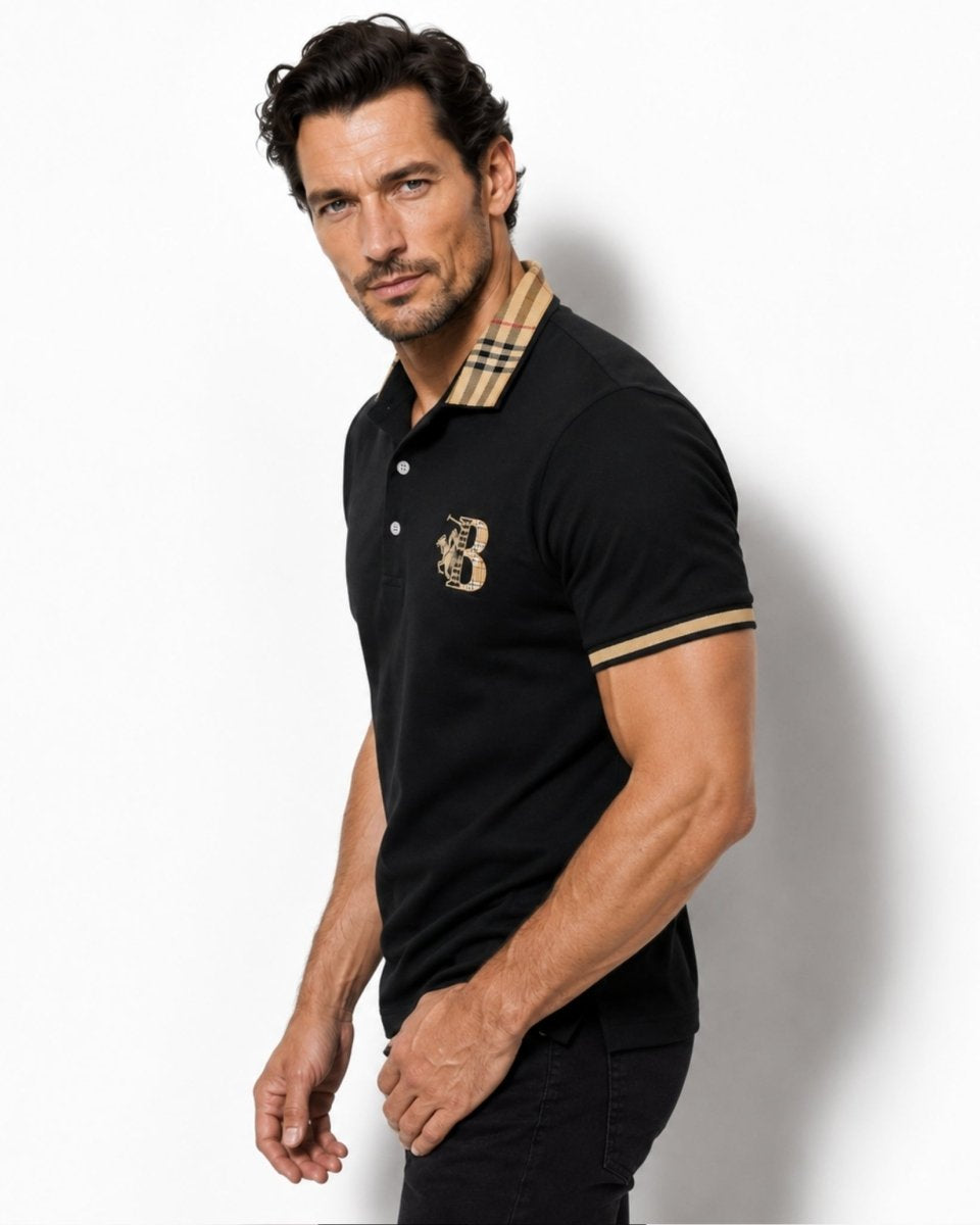 Man wearing a black polo shirt with a brand logo on a white background