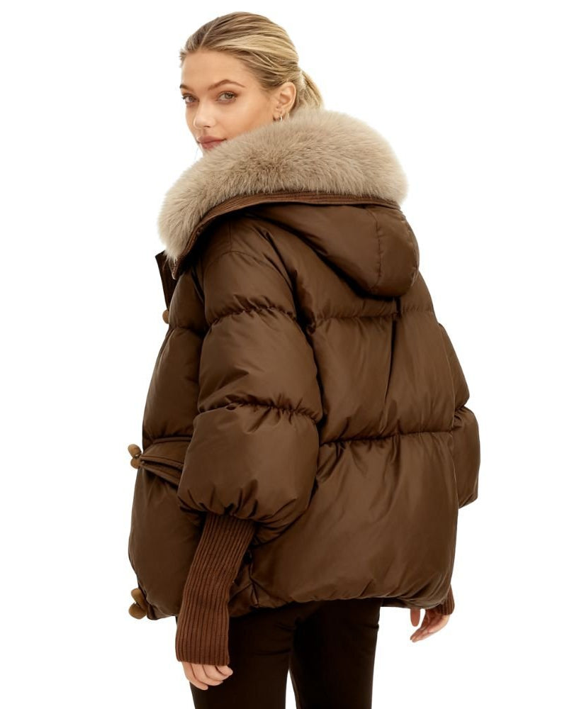 Brown fenlo form puffer jacket with fur hood on a white background