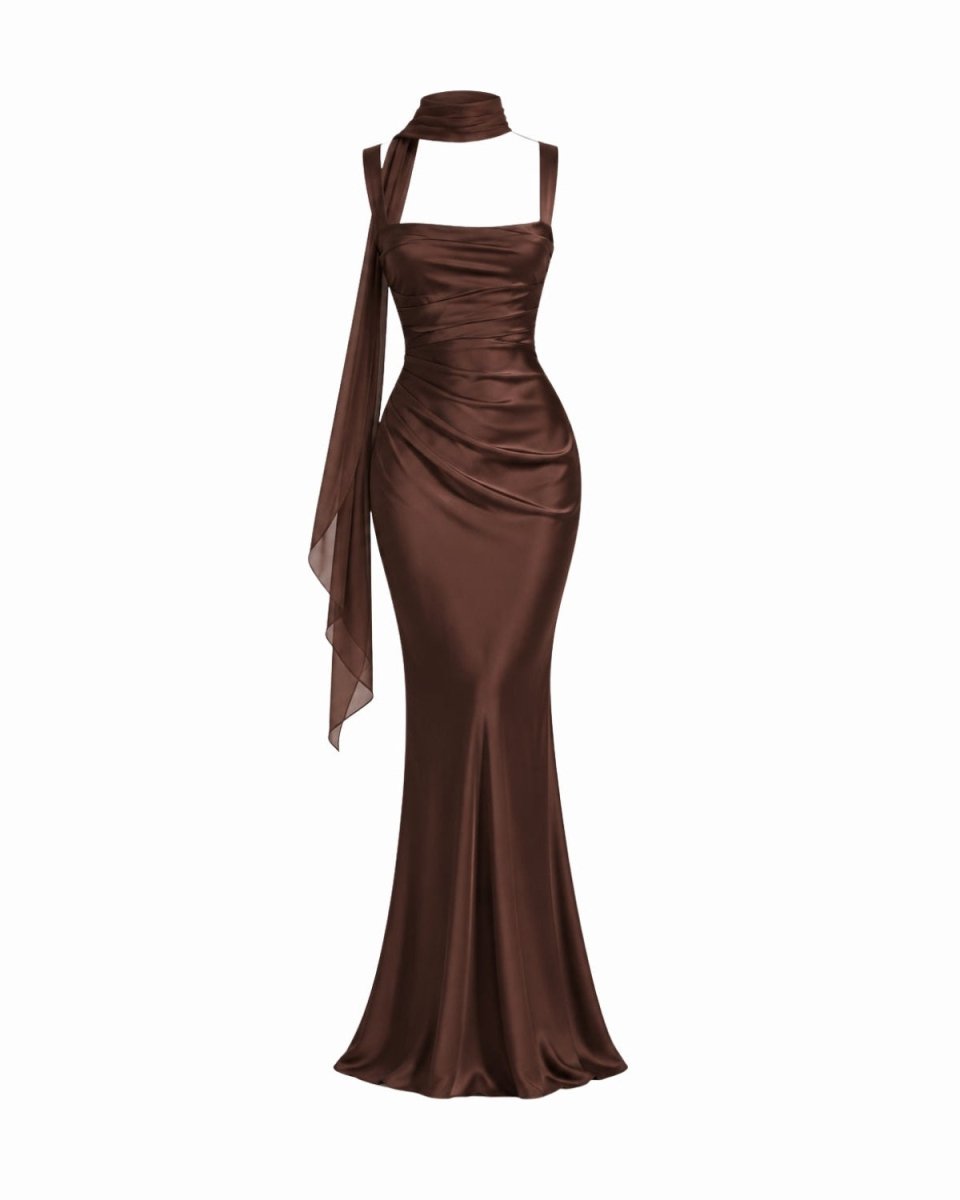 A dark brown halter-neck maxi dress with a draped side detail, shown on a plain white background.