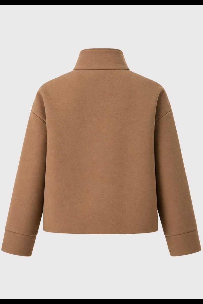 Back flat lay view of camel cropped button up jacket showing seamless design.