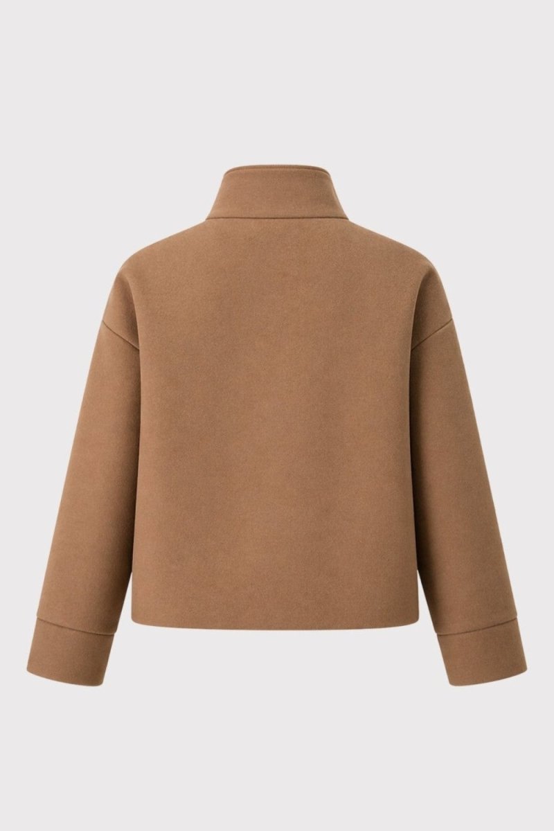 A tan cropped jacket with a mock neck and long sleeves, shown from the back on a light gray background.