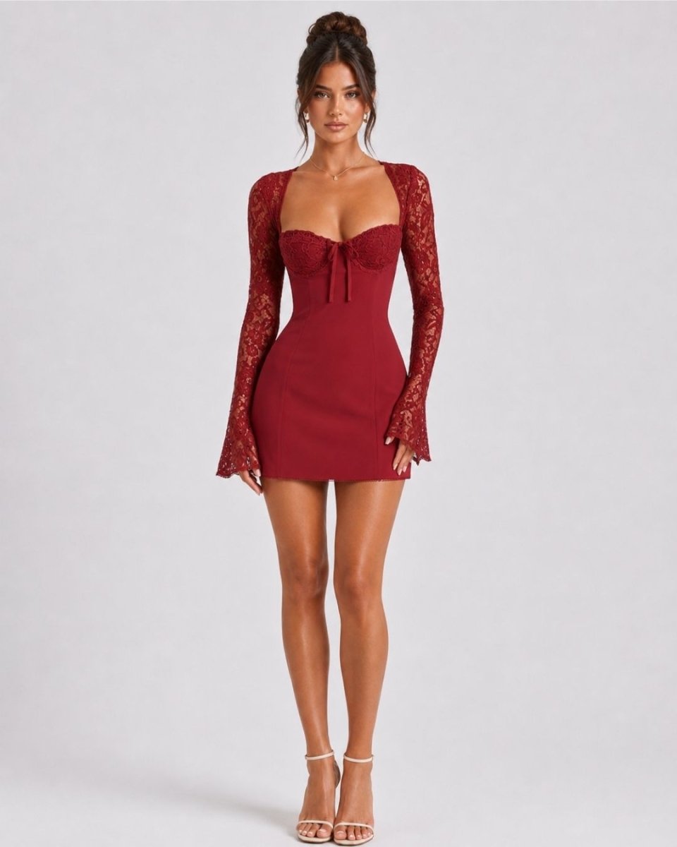A woman modeling a deep red mini dress with long lace sleeves, a sweetheart neckline, and a front bow detail, photographed against a light gray studio background.