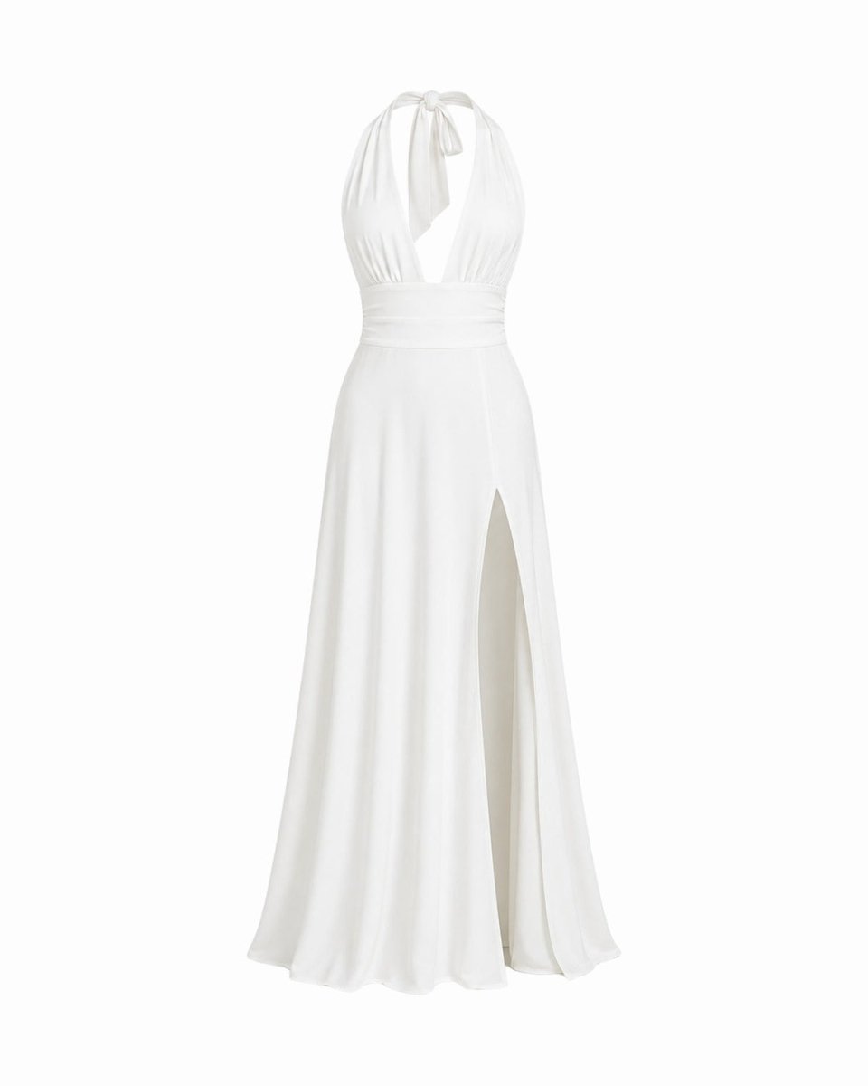 A white halter-neck maxi dress with a high side slit, shown on a plain white background.