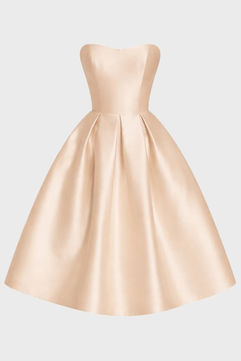 Ghost mannequin front view of luxurious champagne satin sweetheart midi dress showing box pleat details