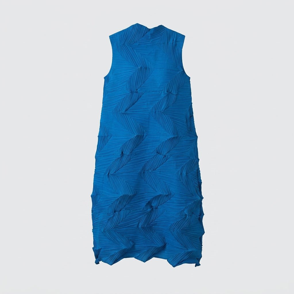 Studio flatlay of the back of the cobalt blue textured chevron pleated sleeveless midi dress.