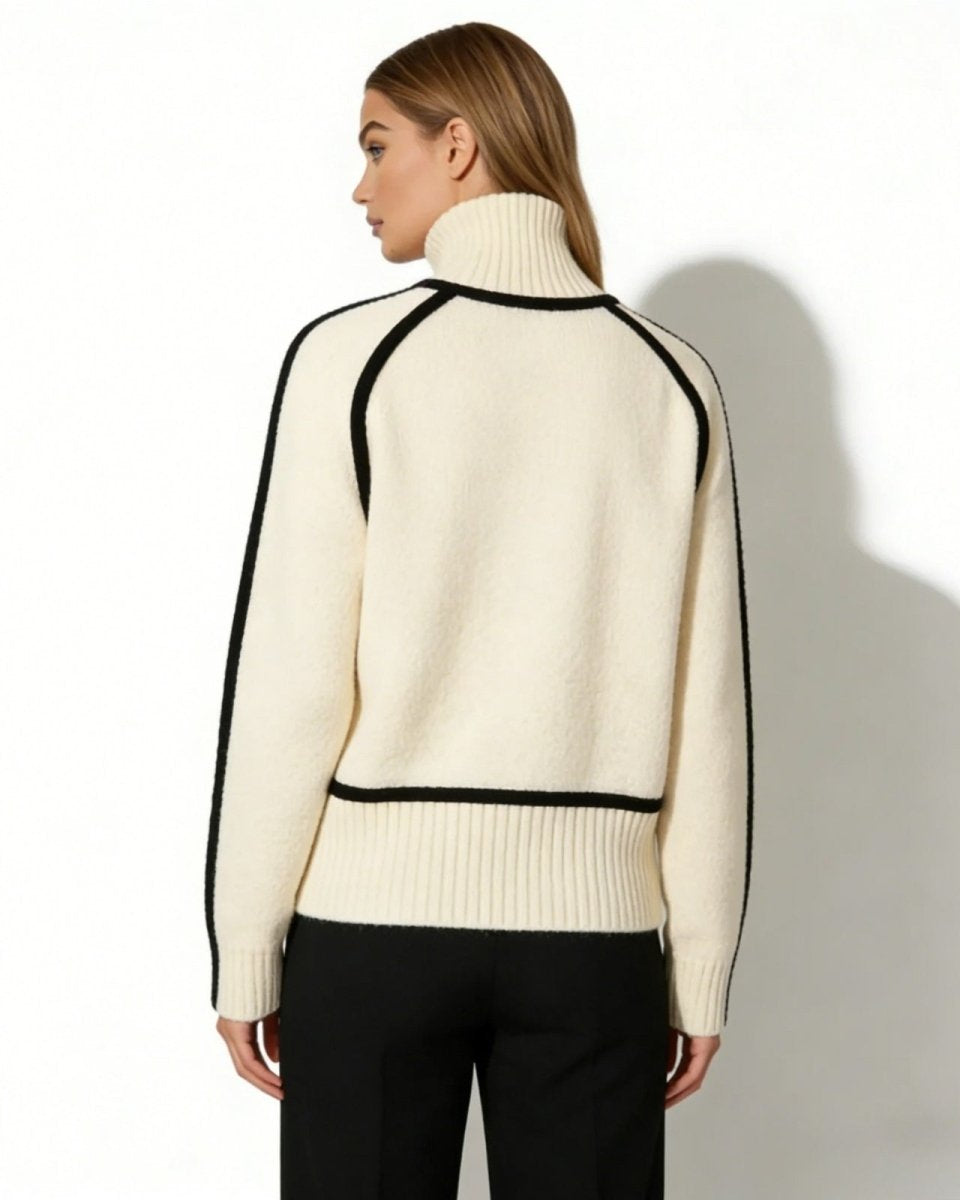 Back view of the artisan trim turtleneck sweater in off-white, highlighting the clean lines of the raglan sleeves.