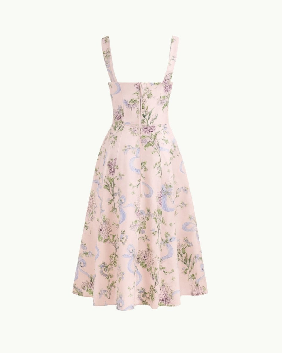 Close-up detail of the sweetheart neckline, tie-front feature, and jacquard fabric of the yellow rose floral midi dress.