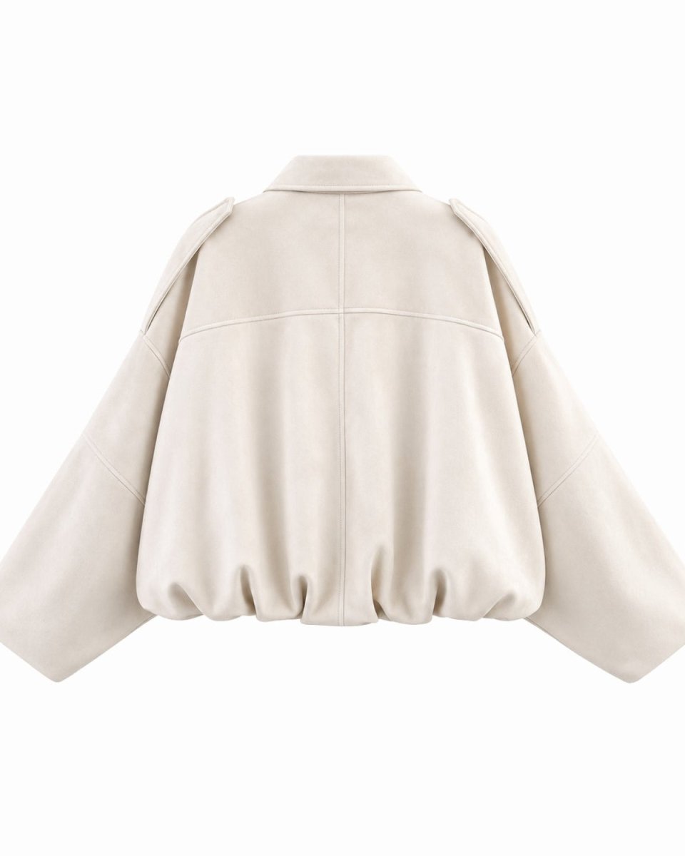 A cream-colored cropped jacket with wide, balloon sleeves and structured shoulder details, shown from the back on a solid white background.