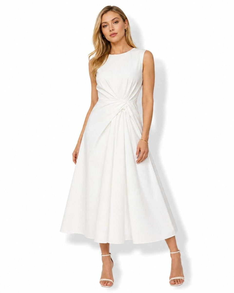 Front view of luxury crisp white sleeveless midi dress with architectural twist waist detail perfect for summer events and elegant daytime wear.