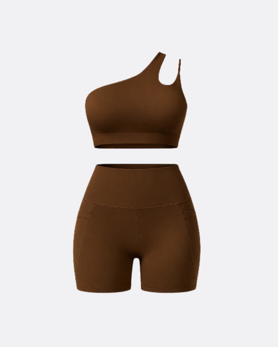 Flat lay front view of dark brown one shoulder crop top and pocket biker shorts set
