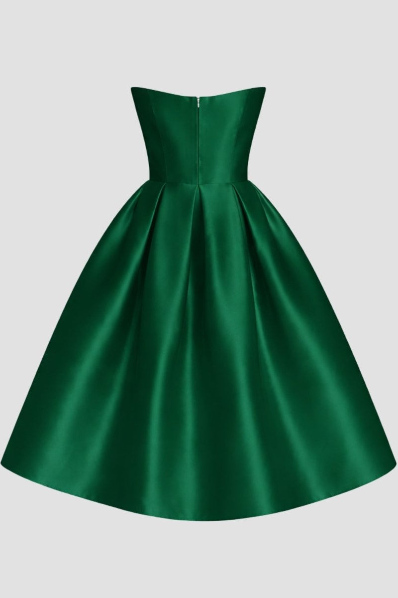 Ghost mannequin back view of the green formal satin dress displaying the tailored back seams and wide flared skirt.