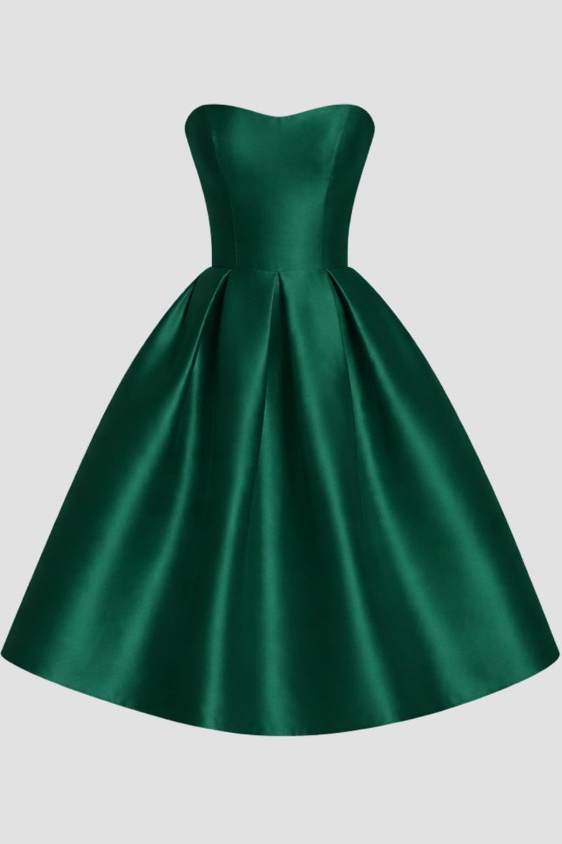 Ghost mannequin front view of the luxury dark green strapless sweetheart A-line midi dress showcasing fabric sheen and pleat details.