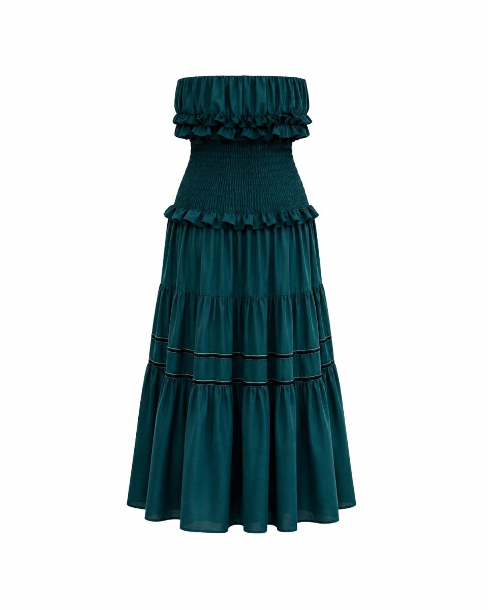 Studio flat lay shot of dark green tiered ruffle maxi dress showing horizontal piping details on a white background.