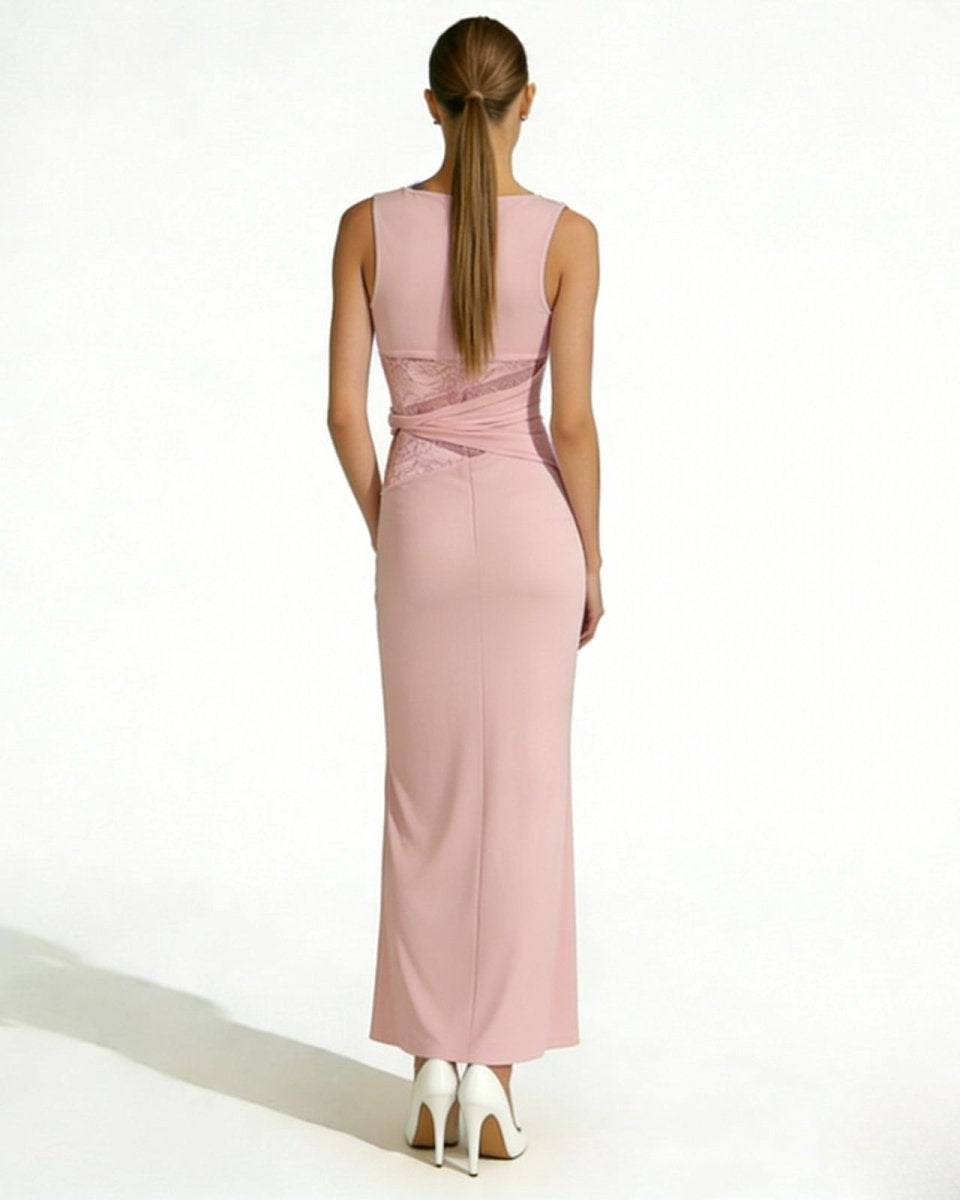 Back view of the deborah pink long evening dress, showcasing the crossover lace detail at the waist and elegant open back.