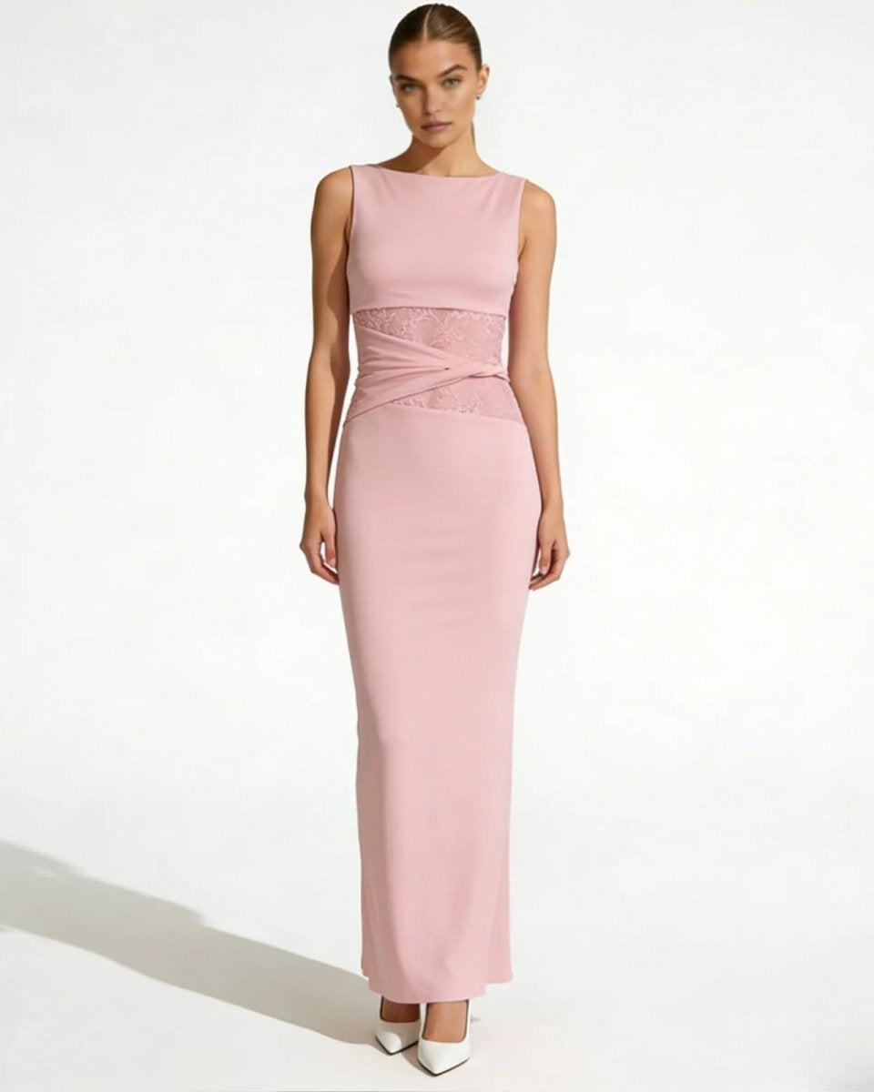 Model wearing the deborah pink sleeveless formal gown with intricate lace waist detail, viewed from the front.