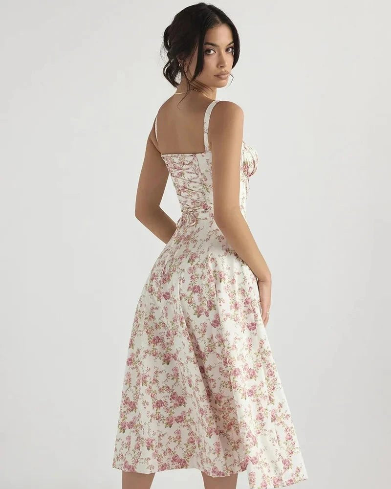 Woman wearing a floral dress on a white background