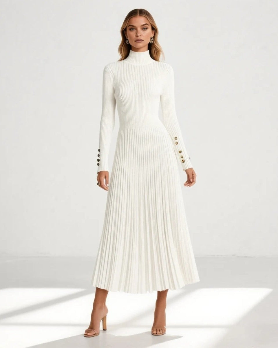 Model wearing the Dianne white ribbed knit pleated midi dress, viewed from the front, showcasing its elegant silhouette.