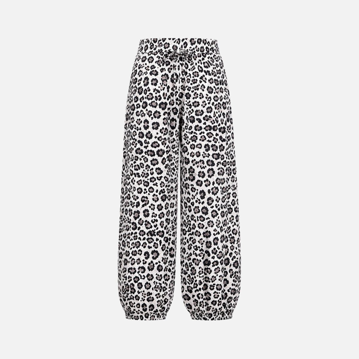 Flat lay detail of elastic waist animal print pants revealing the adjustable drawstring and gathered waistband construction