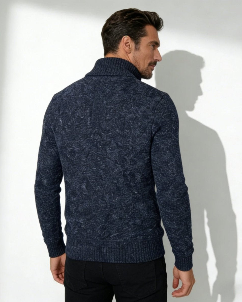 Back view of the Elyson quarter-zip sweater in navy marl, highlighting the intricate textured knit pattern across the shoulders.