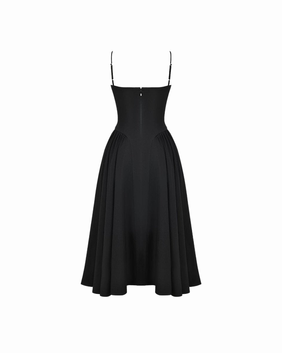 High-quality studio photo of the back of the Evdokia black midi dress, showing zipper detail and strap construction.