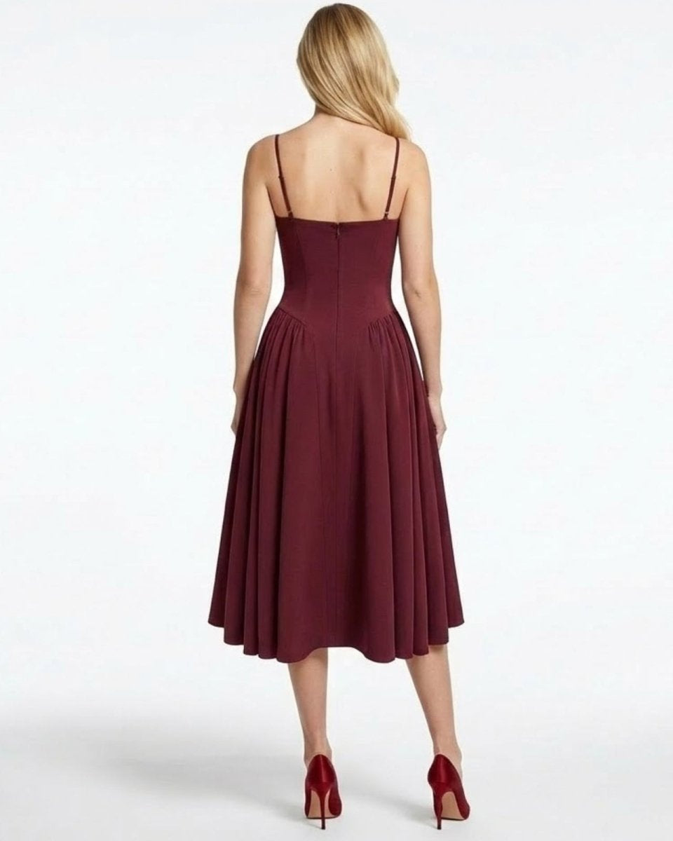 Back view of the Evdokia burgundy dress showcasing the spaghetti straps and concealed zipper closure