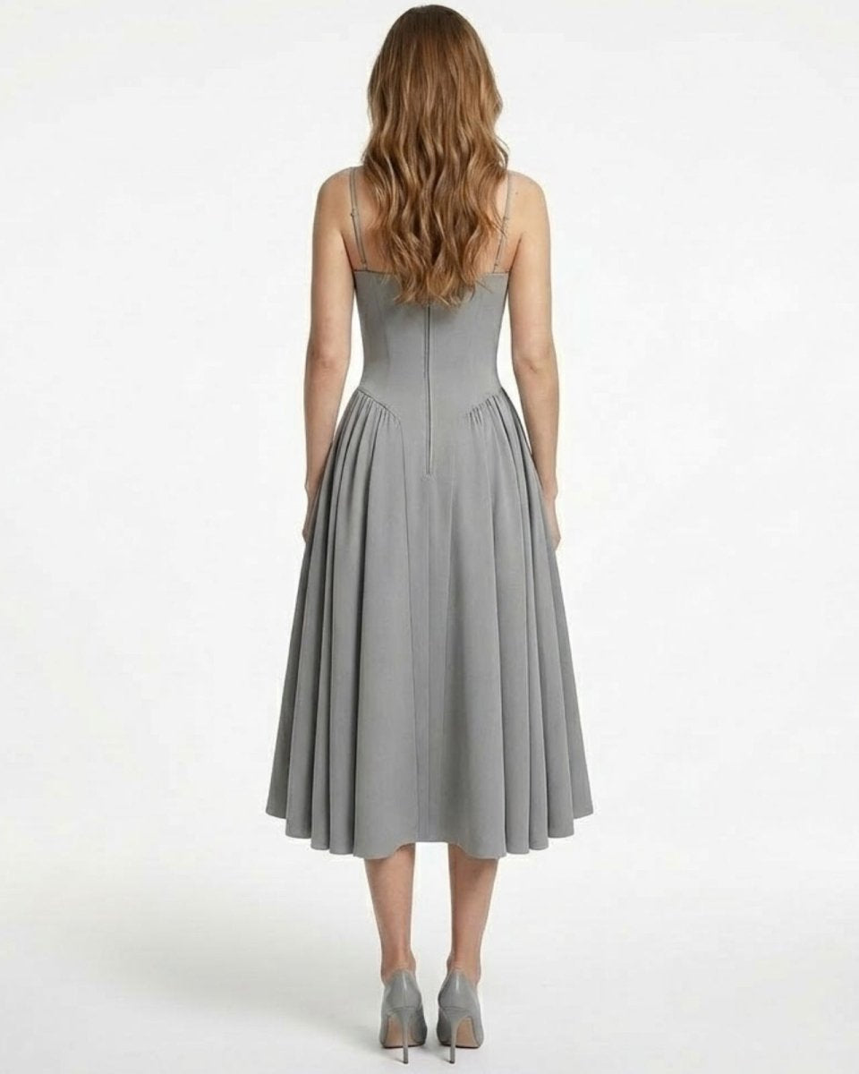 Back view of the Evdokia grey corset dress, detailing the spaghetti straps and concealed zipper.