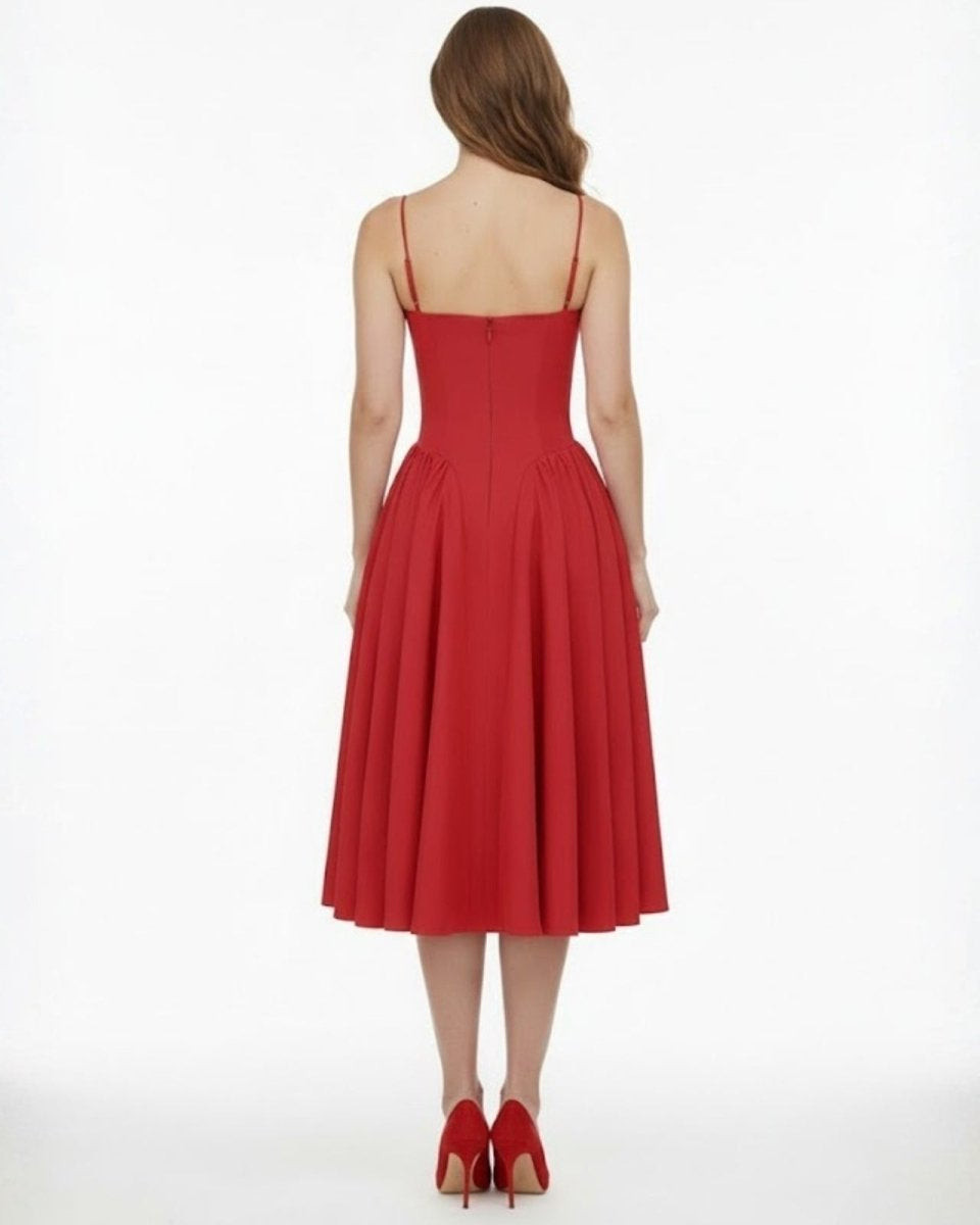 Back view of the Evdokia red midi dress showing the thin spaghetti straps and concealed zipper detail.