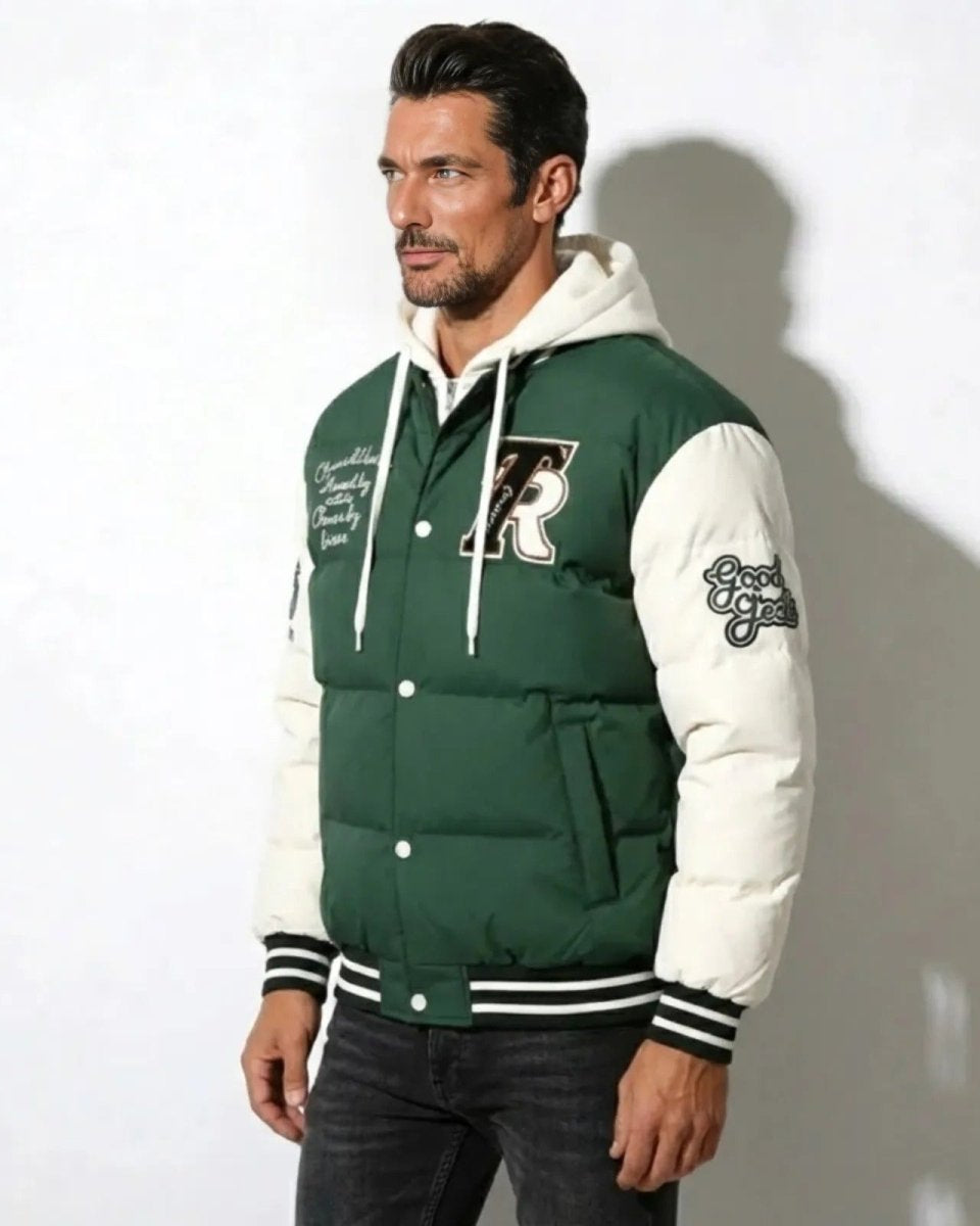 Side profile of a man in the green Puffer Letterman Jacket, highlighting the padded white sleeves with 'Good Vibes' patch.