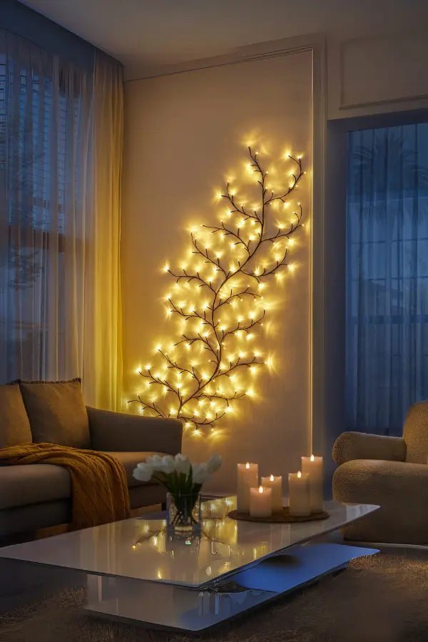 Decorative wall light fixture shaped like a feather in a living room setting.