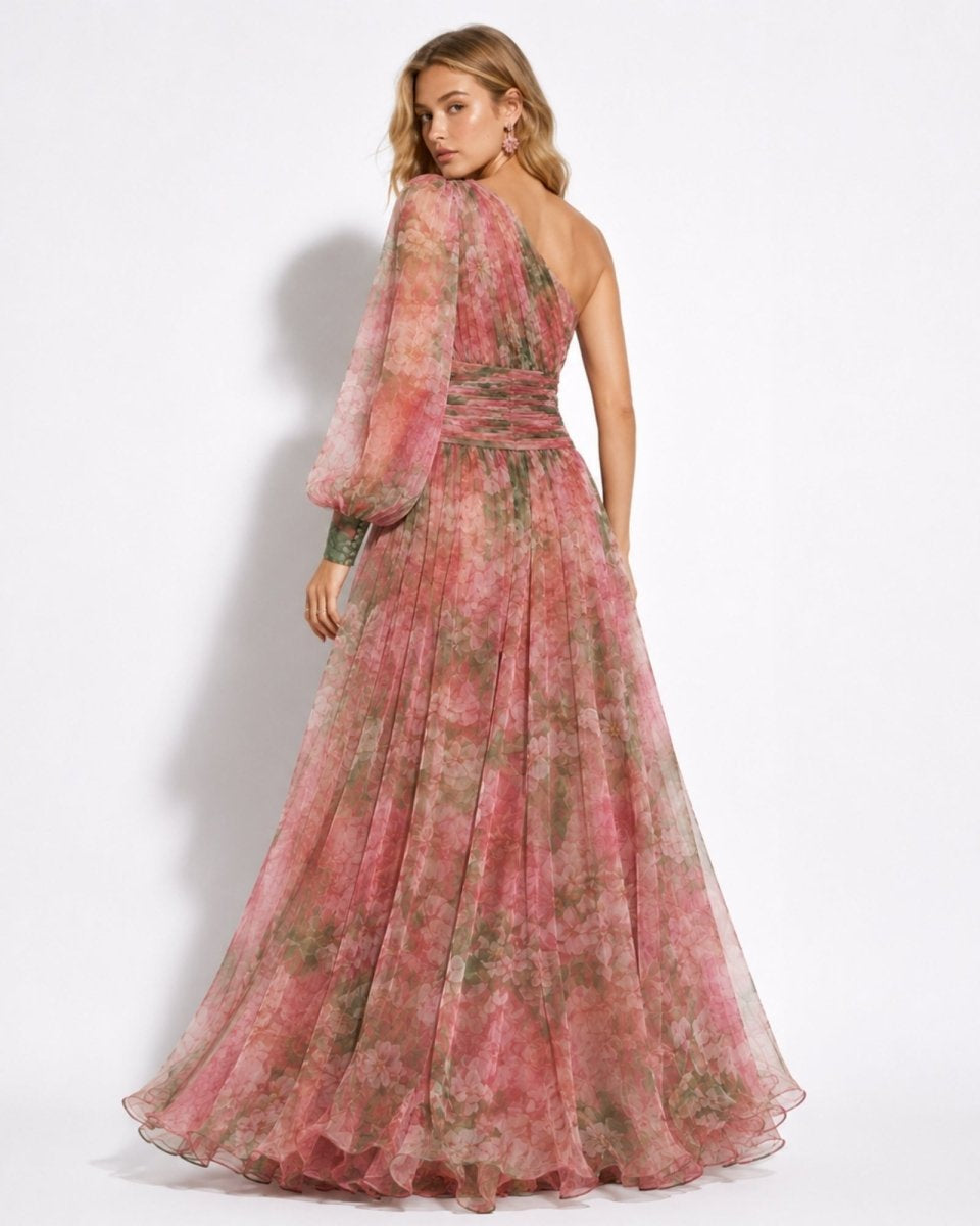 Woman wearing a pink floral dress on a white background