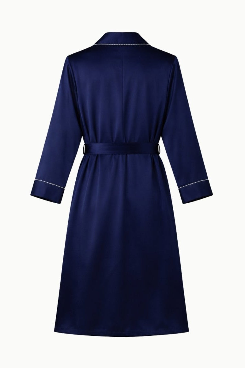 Back view of the folded navy silk dressing gown, displaying the quality craftsmanship and sheen of the 100% Mulberry silk.
