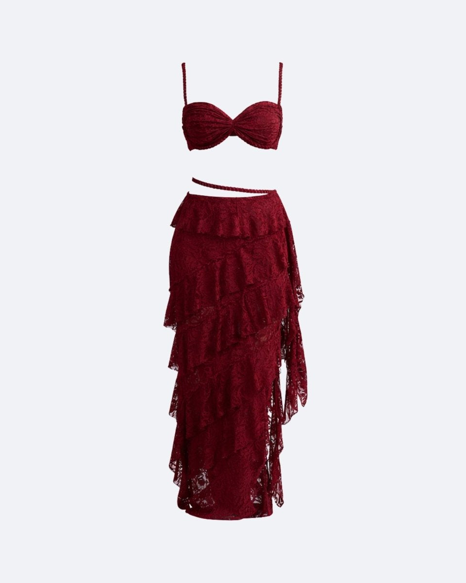Ghost mannequin product shot of a wine red floral lace bustier top and matching high-low tiered ruffle maxi skirt set.