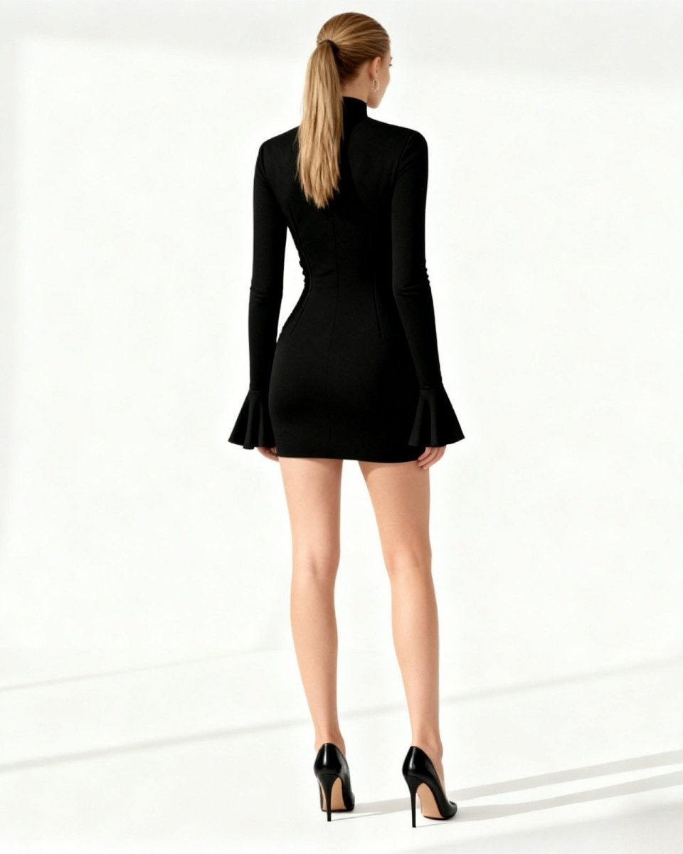 Woman wearing a black dress on a white background