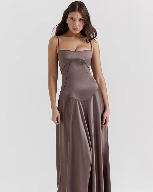 Gabriella Gown in Mocha: a brown satin corset maxi dress with a lace-up back, worn by a model.