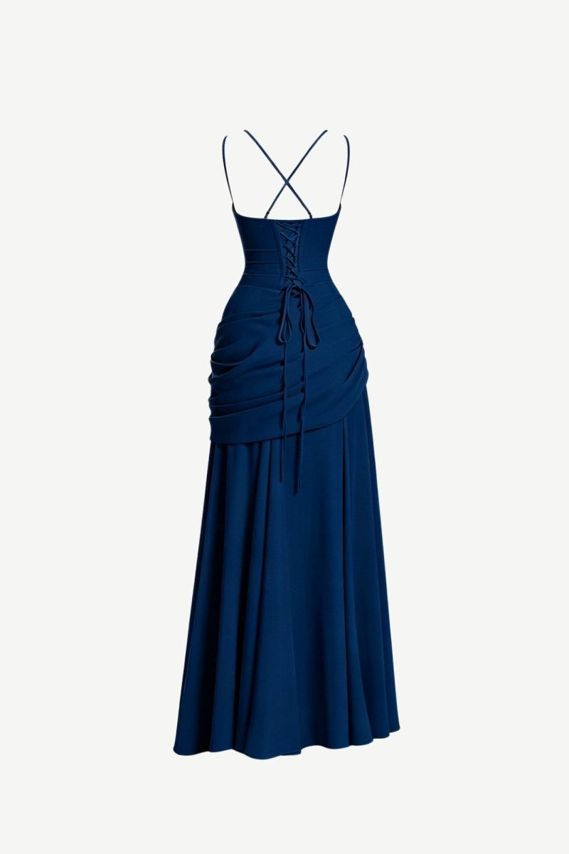 Back view ghost mannequin product photography of a dark blue formal dress highlighting the adjustable corset tie closure and open back design.