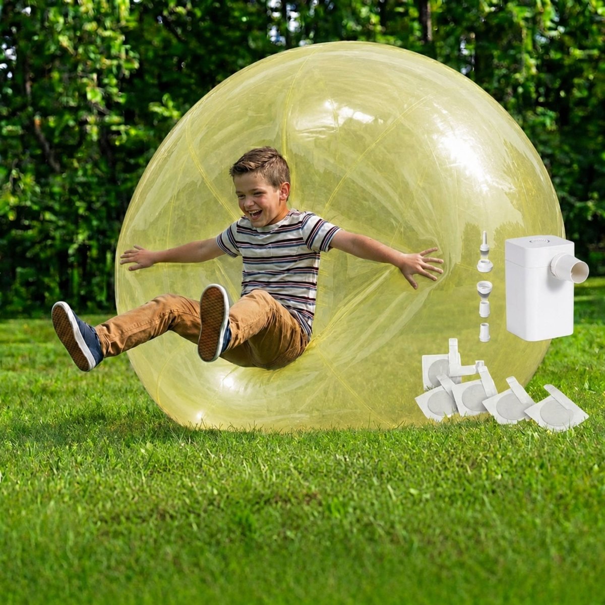 Yellow giant bubble ball toy set on the grass, including a portable electric pump and patches, marketed as the complete fun package for families.