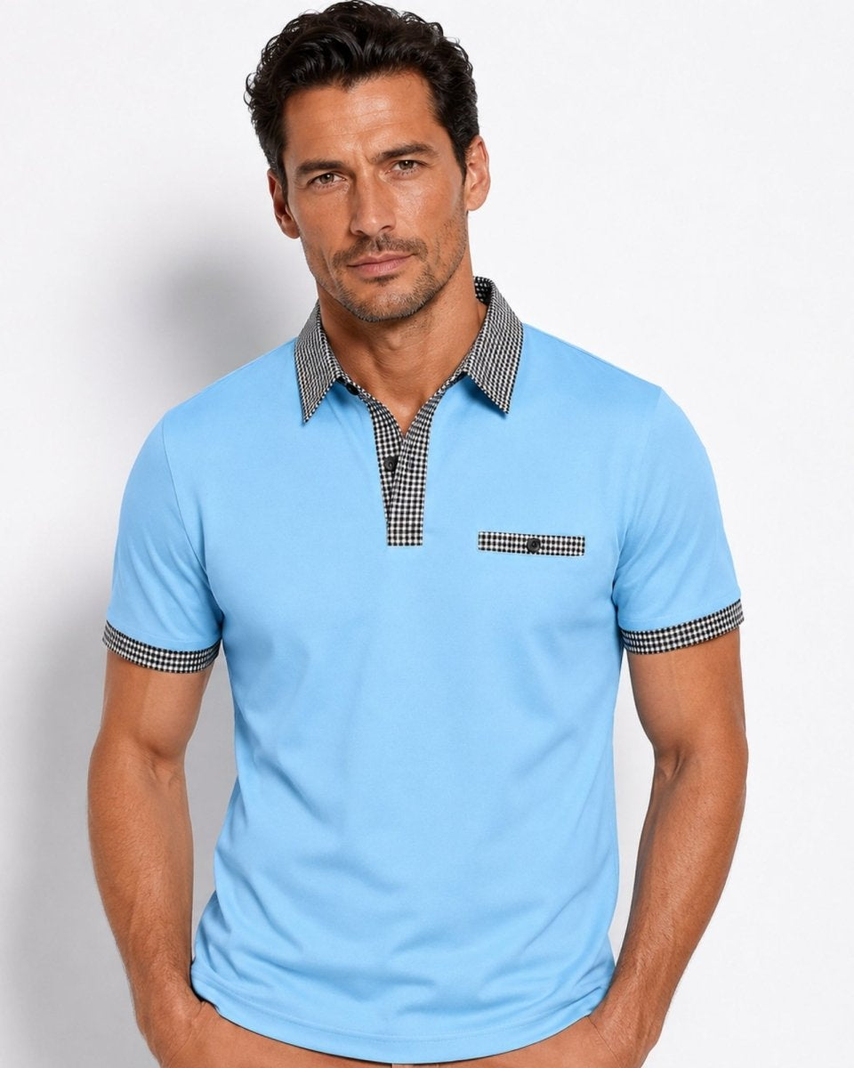Man wearing a light blue polo shirt with checkered collar and sleeve trim on a white background